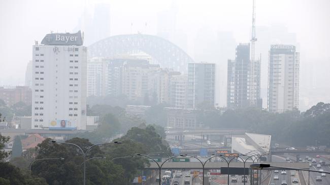 The Sydney Harbour Bridge is shrouded in smoke earlier this week. Picture: Damian Shaw