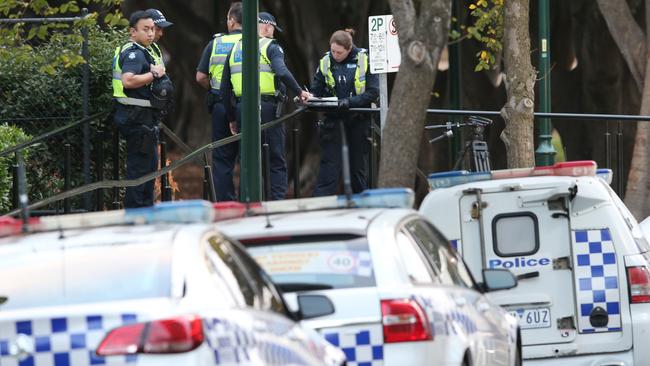 Police swarmed the South Yarra park after the fatal shooting. Picture: David Crosling