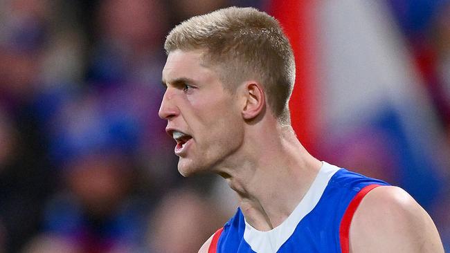 GEELONG, AUSTRALIA - AUGUST 26: Tim English of the Bulldogs celebrates a goal during the round 24 AFL match between Geelong Cats and Western Bulldogs at GMHBA Stadium, on August 26, 2023, in Geelong, Australia. (Photo by Morgan Hancock/Getty Images)