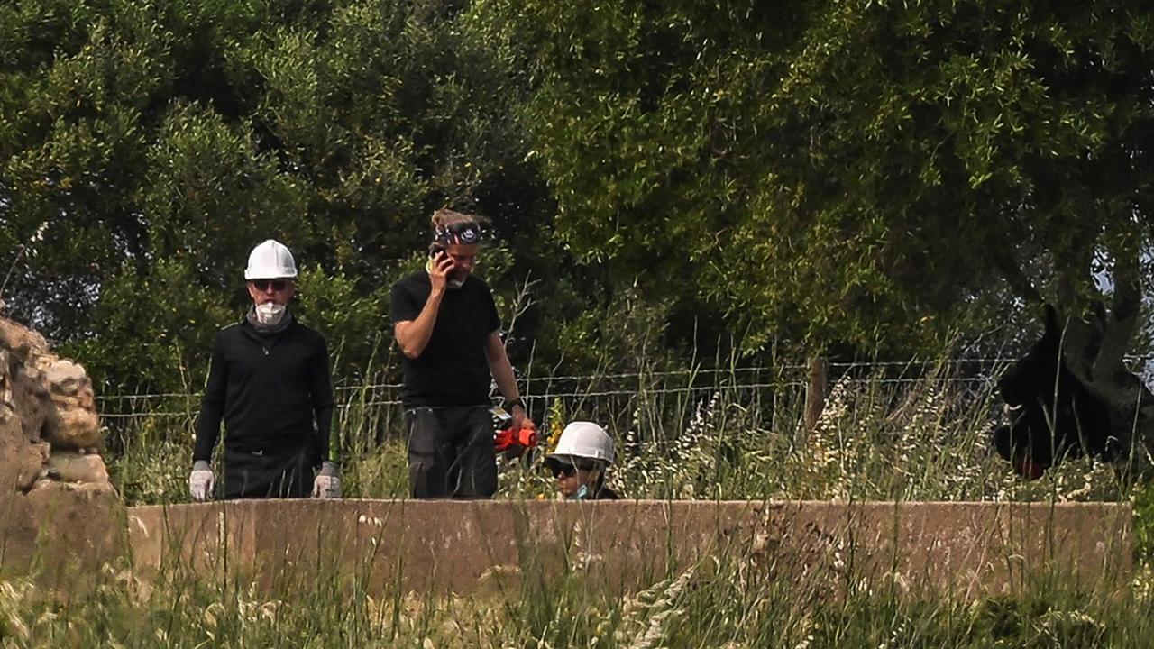 The search is focusing on wells, ruins, and water storage tanks. Picture: Patricia De Melo Moreira / AFP