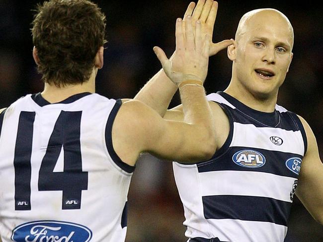 14/08/2010 SPORT: Western Bulldogs v Geelong. Etihad Stadium. Gary Ablett high 5's Joel Selwood after Selwood goaled on the run