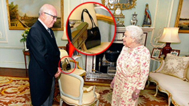 George Brandis meets Queen Elizabeth II.