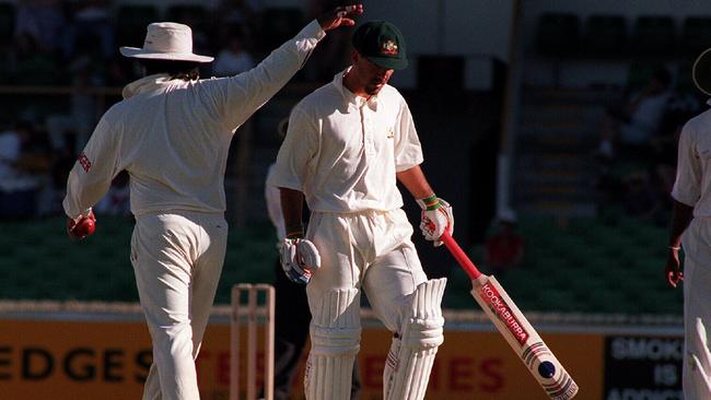 Ponting leaves the field after controversially being given out LBW on 96 runs in his debut innings.