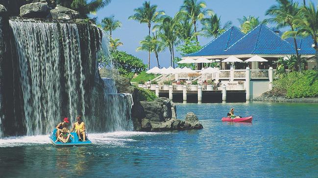 Guests share the lagoon with turtles and fish at the Hilton Waikoloa Village Picture: Supplied.