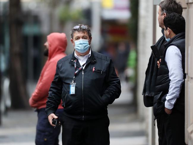 A Unified Security guard outside the Adina Apartment Hotel near Town Hall in Sydney. Picture: Jonathan Ng