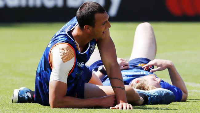 Braydon Preuss feels the pain after a North Melbourne pre-season time-trial. Picture: Michael Klein