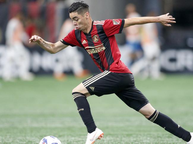 FILE - In this file photo dated Sunday, June 24, 2018, Atlanta United midfielder Miguel Almiron in action against the Portland Timbers during an MLS soccer match, in Atlanta, USA.  Miguel Almiron, one of the star players in U.S. Major League Soccer, became the most expensive signing in Newcastleâ€™s 127-year history on Thursday Jan. 31, 2019, when he moved to the English Premier League club for a reported U.S. dollars 27 million on transfer deadline day. (AP Photo/Brett Davis, FILE)
