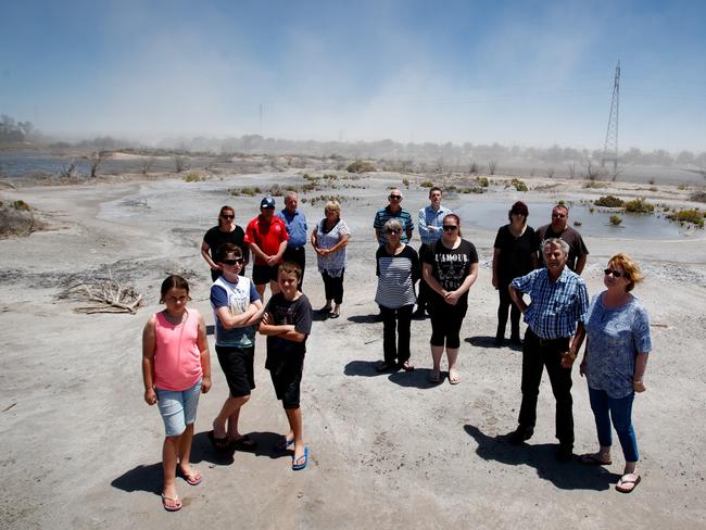 Furious Port Augusta residents near the decomissioned Northern Power Station, from which ash is being blown across their town. Picture: Matt Turner