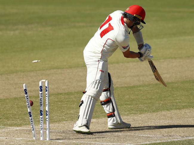 MELBOURNE, AUSTRALIA - APRIL 04: Daniel Worrall of South Australia is bowled by Will Sutherland of Victoria during day 2 of the Sheffield Shield match between Victoria and South Australia at Junction Oval on April 03, 2021 in Melbourne, Australia. (Photo by Darrian Traynor/Getty Images)