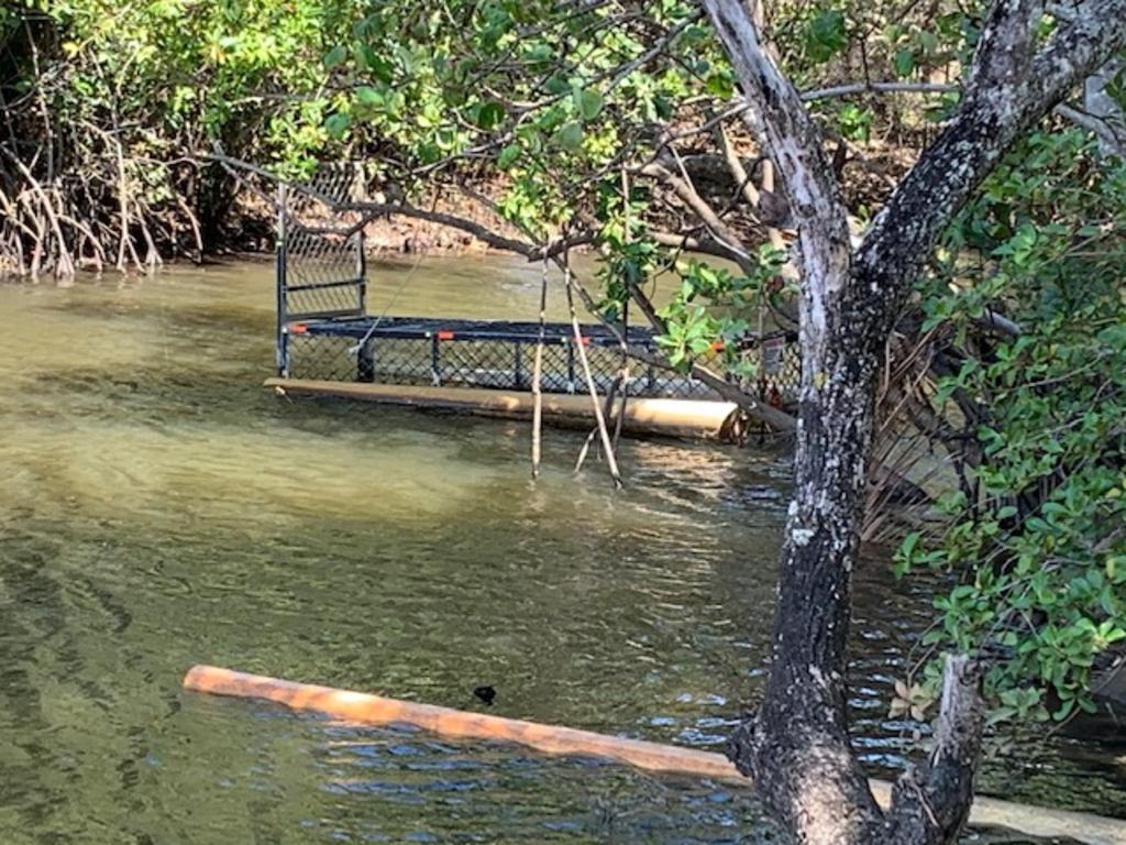 A crocodile trap has sat in the river for months where a crocodile is suspected of eating a dog. Picture: Supplied