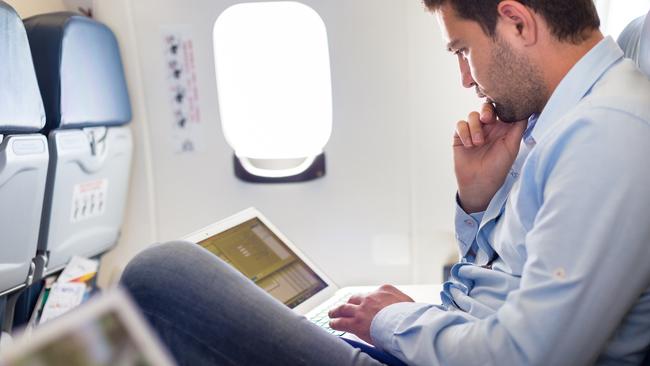 Put away your laptops. Sit back, relax and enjoy some in-flight entertainment. (Pic: iStock)