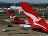 Qantas boss loses $1m as 1000 jobs go