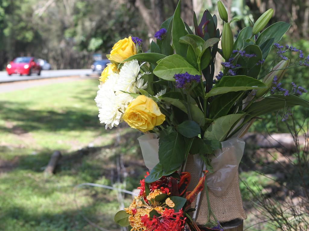 Floral tributes at the scene of the crash. Picture: Richard Gosling.