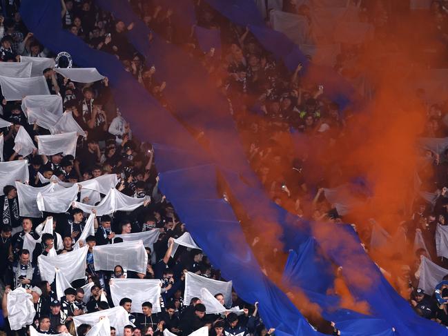 Victory fans let off flares in the stands during the A-League Men Grand Final match between Melbourne City and Melbourne Victory at AAMI Park Picture: Graham Denholm/Getty Images