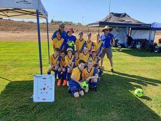 HAPPY TEAM: Back Row - Mark Holmes, Leyden Sailor, Jimmy Keogh, Lincoln McErlain, Jack Lamberton, Xavier Blomfield, James Hoger (manager). Middle row -Eamon Ruhl, Daniel Gray, Kynan Holmes, Noah McClure, Tighe Butt-McGuire, Kai Codrington. Front row - Jacob Hoger, Braith Kammholz. Picture: U11 soccer - 310719