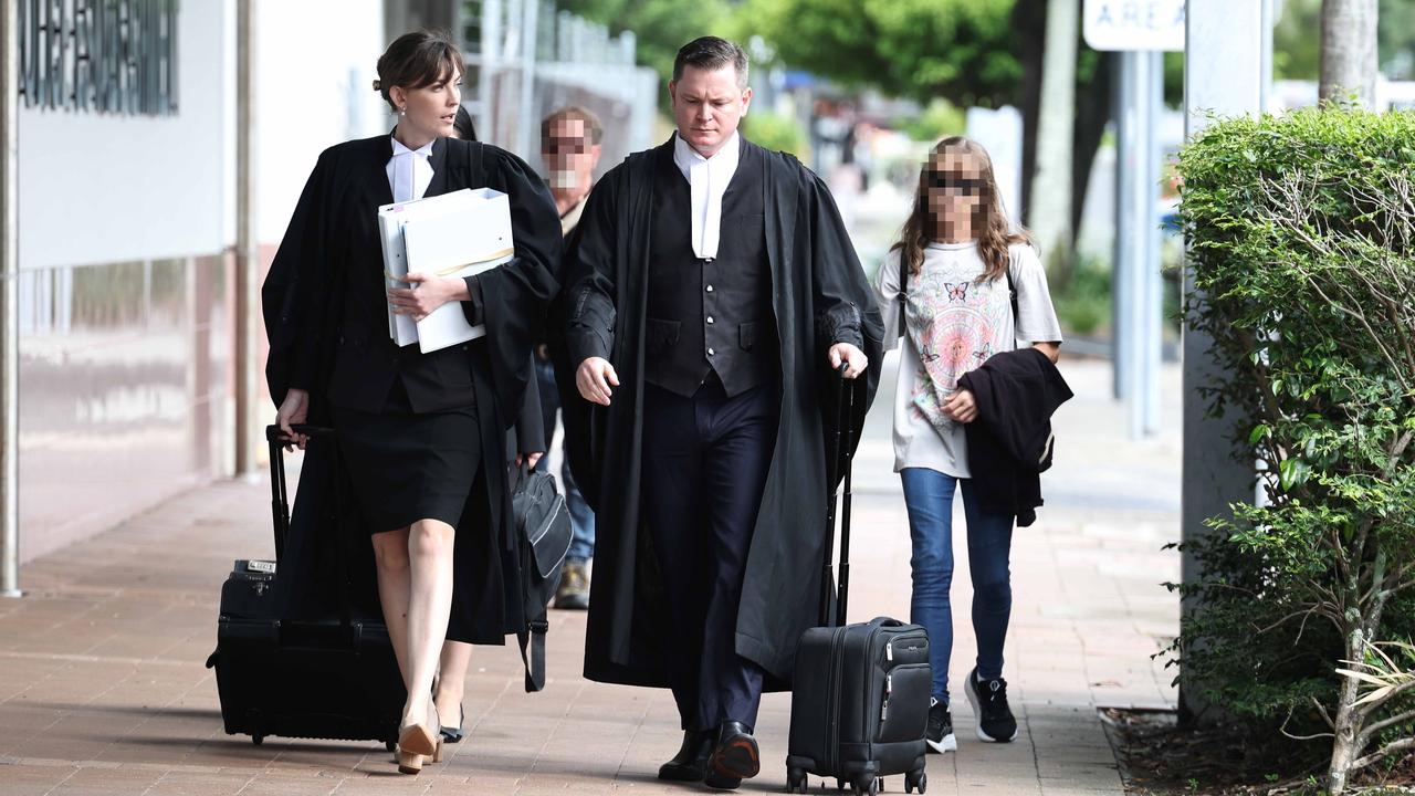 Office of the Director of Public Prosecutions barrister Nathan Crane with instructing barrister Hannah McNeale enters the Cairns Supreme Court on the first day of the trial. Picture: Brendan Radke