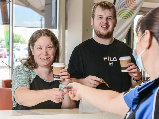 APRIL 6, 2022: Verity Chattaway and Matthew Bartley buy a coffee after they learned how to handle their money through a Playford Council Everyday Money Skills program. Picture: Brenton Edwards