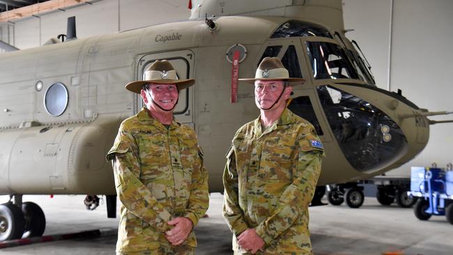 Major Keiran Morgan and Major Anthony Griffith are leaving the army 5th Aviation Regiment after a combined service of 80 years. Picture: Evan Morgan