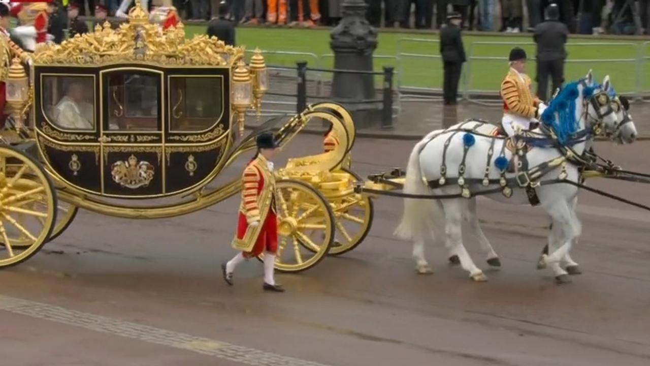 King Charles III and Camilla travelling in the Diamond Jubilee Coach.