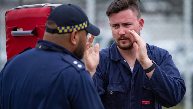 <i>NewsLocal</i> State Political Reporter Jake McCallum during riot training. Picture: Julian Andrews