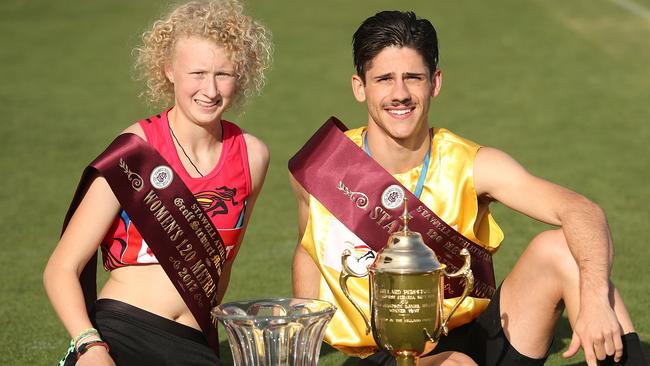 Teenage rampage: Liv Ryan and Matthew Rizzo with their trophies after winning their respective Stawell Gift finals. Picture: Getty Images