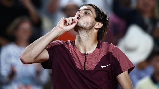 Taylor Fritz shushes the raucous French Open crowd. (Photo by Anne-Christine POUJOULAT / AFP)