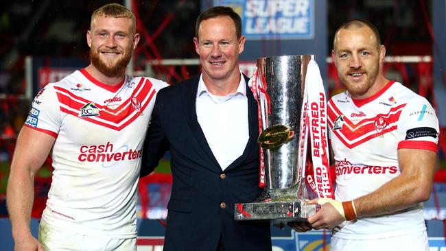 Canterbury signing Luke Thompson (left) with former St Helens coach Justin Holbrook, now with the Titans, and James Roby, celebrating their grand final win over Salford. Picture: Getty