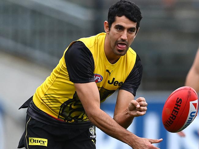 MELBOURNE, AUSTRALIA - JUNE 01: Marlion Pickett of the Tigers warms up during a Richmond Tigers AFL training session at Punt Road Oval on June 01, 2020 in Melbourne, Australia. (Photo by Quinn Rooney/Getty Images)