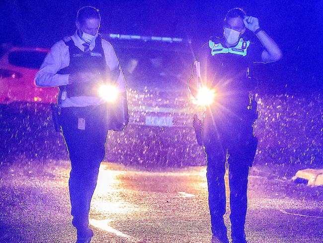 Detectives at the crime scene in Huntingdon Ave, Bayswater on Saturday night. Picture: Ian Currie