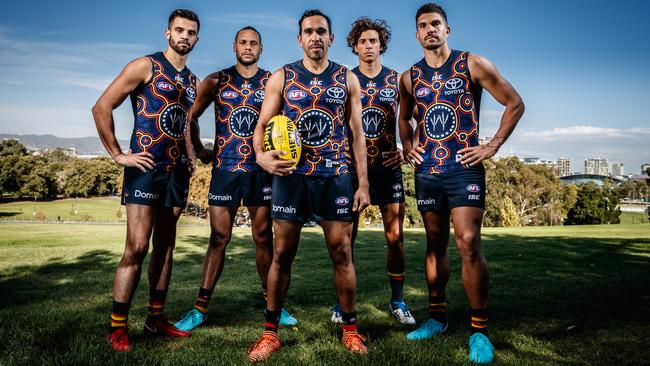 Adelaide Crows’ Aboriginal players Wayne Milera, Cam Ellis-Yolmen, Eddie Betts, Ben Davis and Curtly Hampton wearing the team’s 2018 Indigenous guernsey. Picture: Matt Turner