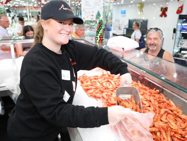 Gabrielle Conor-Wilson serves up prawns, a seafood Christmas staple. Picture: Rohan Kelly