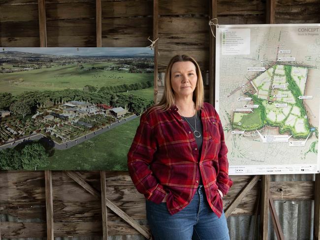 Gisborne local Kylie Ball with the render for community garden at Glen Junor. Picture: Tony Gough