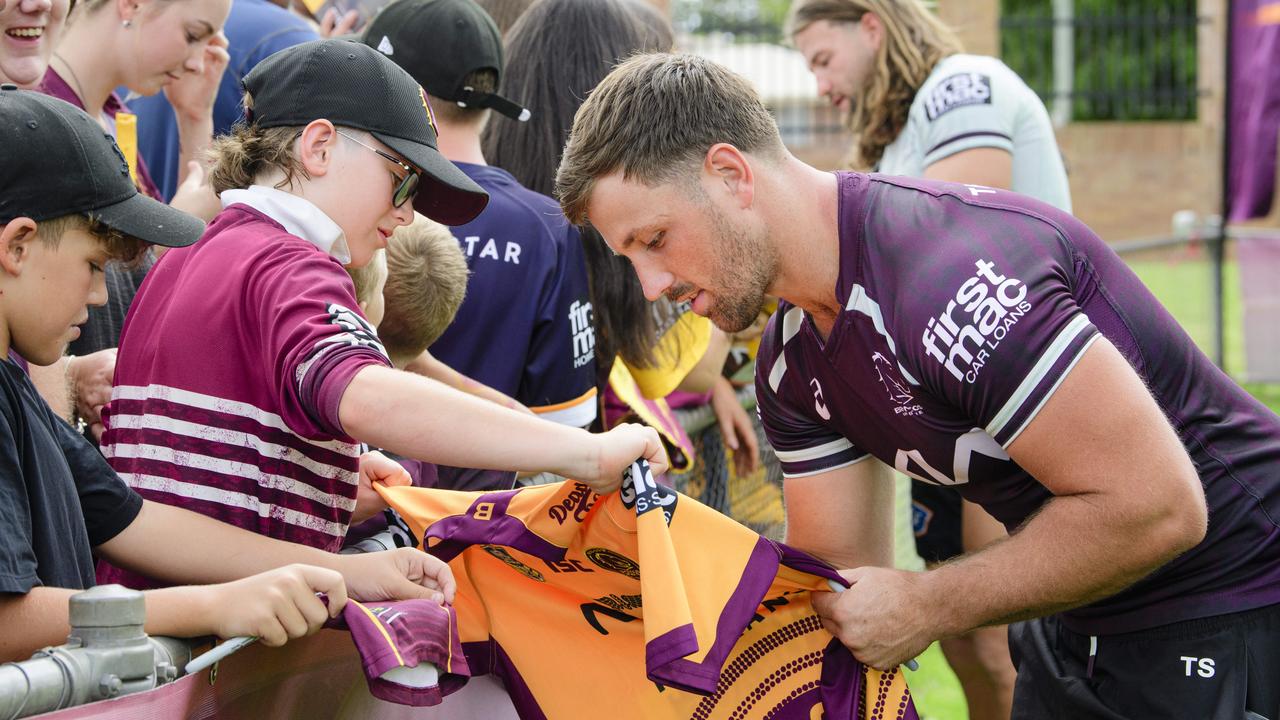 Hugh Martyn has his jersey signed by Tyson Smoothy at the Brisbane Broncos Captain's Run and Toowoomba Fan Day at Toowoomba Sports Ground, Saturday, February 15, 2025. Picture: Kevin Farmer