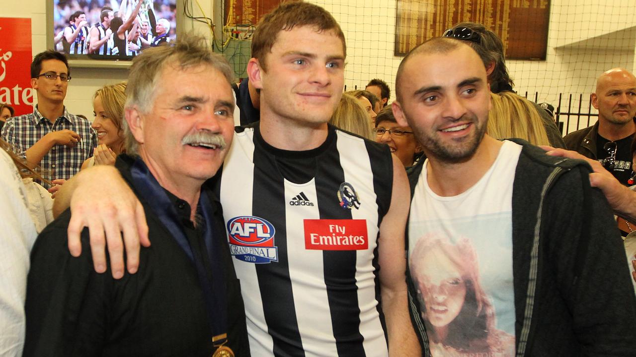 Brothers Heath and Rhyce Shaw with father Ray after the 2010 Grand Final replay.