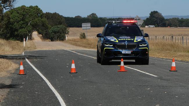 Police at the scene on Mount Pollock Rd in Buckley after a woman’s body was found. Picture: Mark Wilson