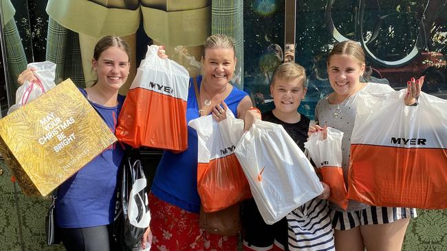 Samantha, Natasha, Kristian, and Anastasia Birt with their Boxing Day bargains. Picture: Rachel Lang