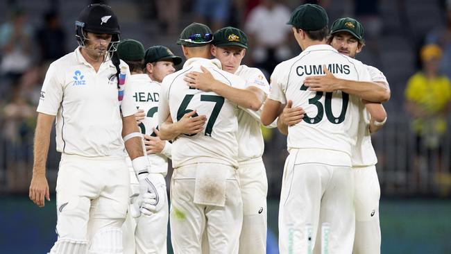 Australia’s players celebrate victory. Picture: AAP