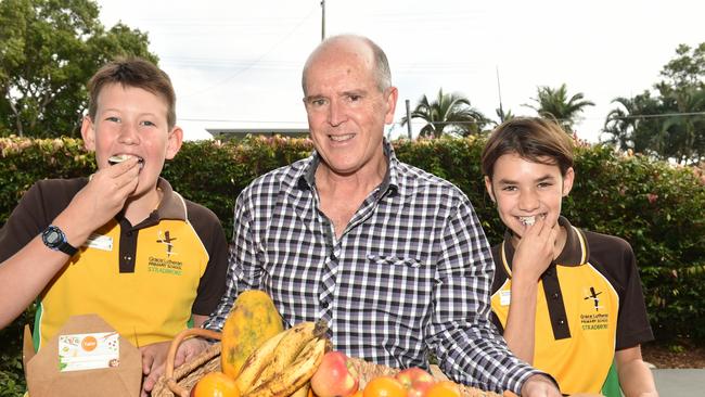 Grace Lutheran Primary School captains Hayden Dymond and Bronte Misso with OAM recipient Sean Gordon