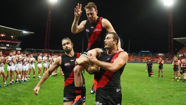 Brendon Goddard is chaired off after his 300th game. Picture: Phil Hillyard