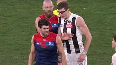 Christian Petrecca and Mason Cox clash after the siren on King's Birthday at the MCG