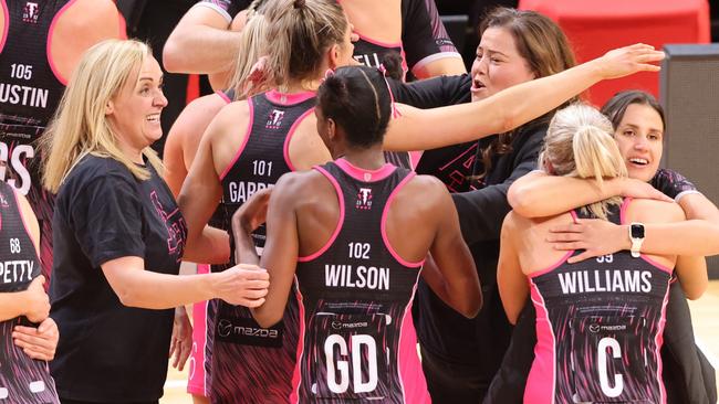 Tania Obst, head coach of the Adelaide Thunderbirds (R) celebrates victory with her team. (Photo by Jenny Evans/Getty Images)