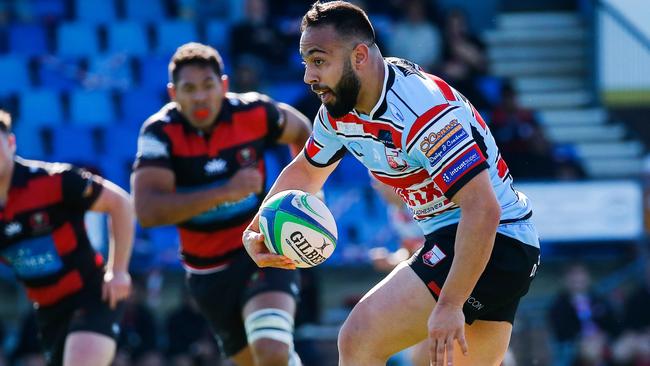 Souths Christian Kagiassis runs at Norths in the 2020 Shute Shield.