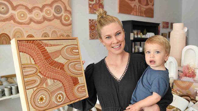 Domica Hall a former PE teacher and Indigenous woman has opened the store, Briar Blooms, in her daughter's honour. Pictured with her son Jyka. Photo: Patrick Woods.