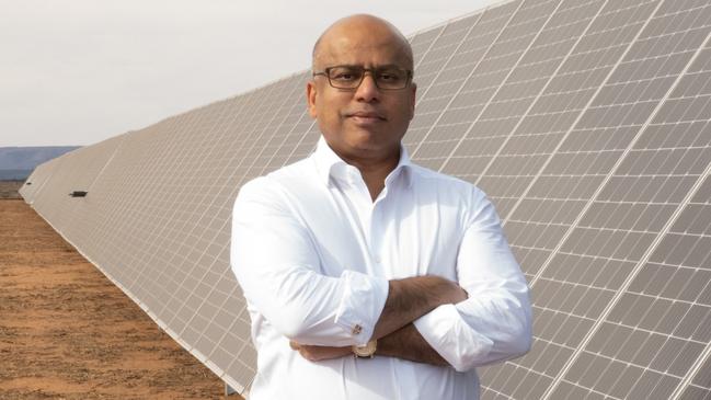 GFG Alliance executive chairman Sanjeev Gupta next to the Cultana solar plant test rig