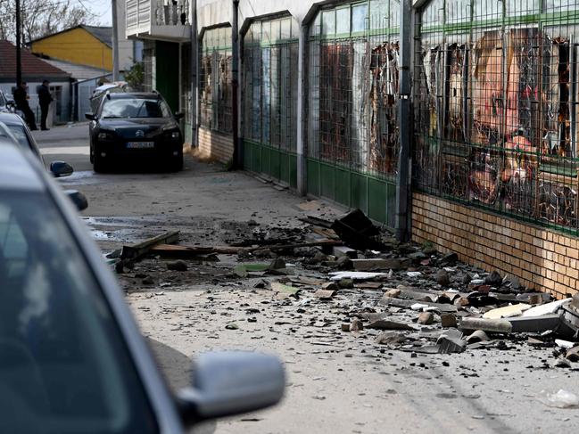 Debris lies on the pavement outside the burnt down nightclub in which revellers died, in Kocani, Macedonia. Picture: AFP