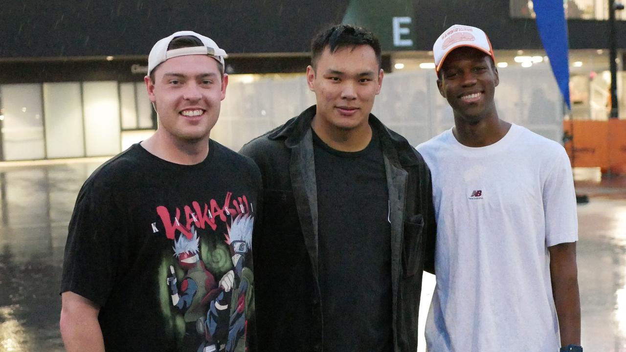 Rick Vanderzant, Anthony Shi, and Nathanael Taviringana at the NRL All Stars matches in Townsville on Friday. Picture: Blair Jackson