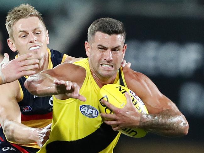 AFL  - Saturday, 19th September, 2020 - Adelaide Crows v Richmond at the Adelaide Oval. Richmond's Jack Graham and Adelaide's David Mackay Picture: Sarah Reed