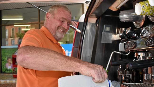 Alby Wagemaker serves up two iced coffees from his mobile coffee van business Cacoffeeney. Picture: Meg Bolton