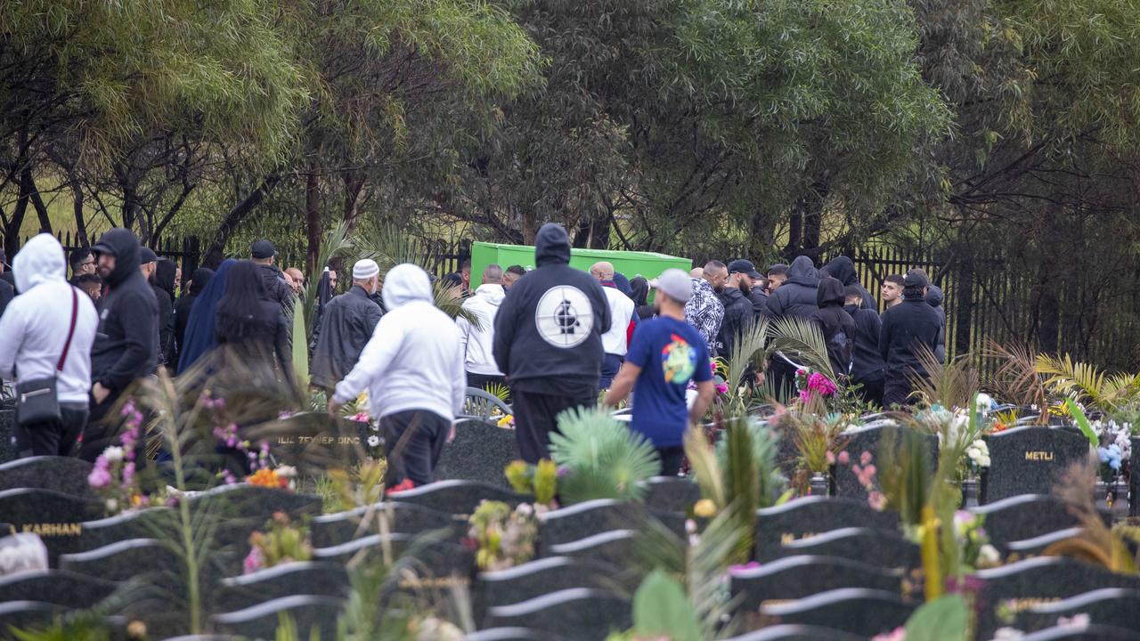 Mourners and police at the funeral of Omar Zahed. Picture: The Australian