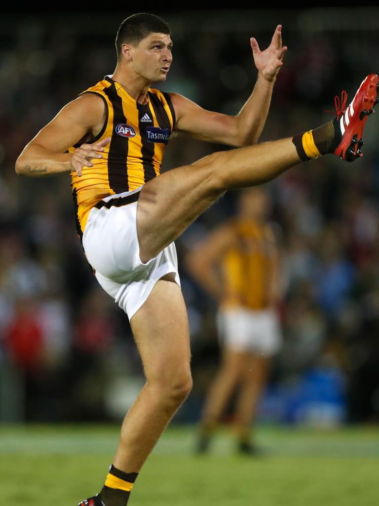 Jon Patton launches a set shot during Hawthorn’s Marsh Series opener.